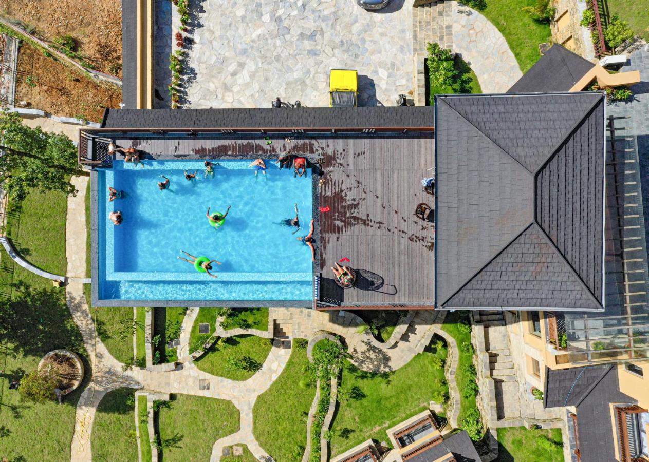 Bar Peepal Resort Pokhara Ngoại thất bức ảnh Aerial view of the pool