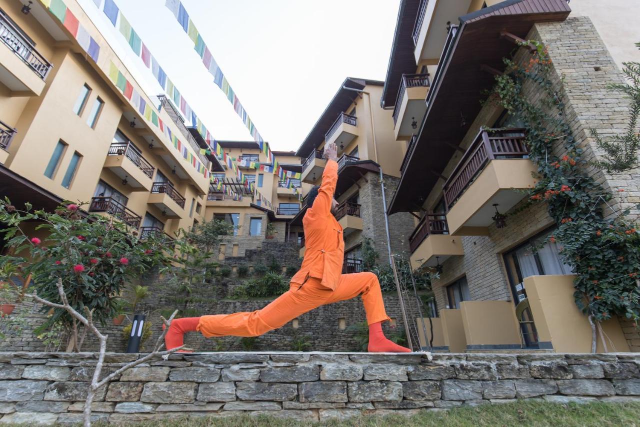 Bar Peepal Resort Pokhara Ngoại thất bức ảnh A student of the Drepung Loseling Nunnery, practicing yoga.