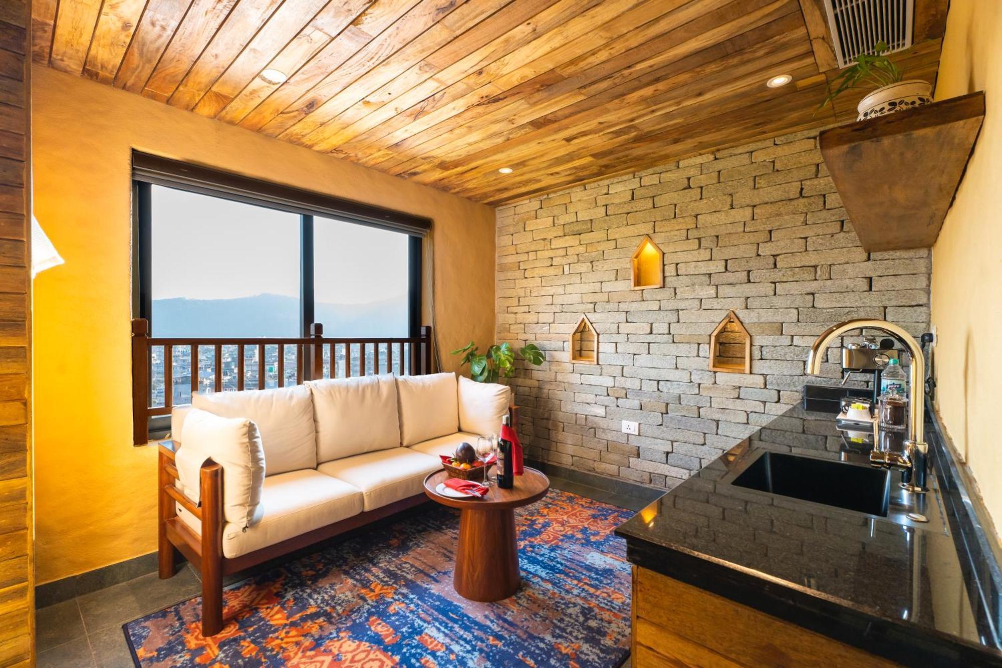 Bar Peepal Resort Pokhara Ngoại thất bức ảnh A living room in a typical apartment